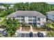 A lovely multi-Gathering unit with multiple levels, balconies, a parking lot, and landscaping at 6253 Catalina Dr. # 1824, North Myrtle Beach, SC 29582