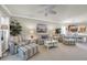 Cozy living room with a ceiling fan, striped furniture, and lots of seaside decorations at 6253 Catalina Dr. # 1824, North Myrtle Beach, SC 29582