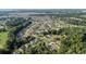 Community aerial showing mature trees, golf course, and water features at 668 Barona Dr., Myrtle Beach, SC 29579