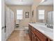 Clean bathroom features a white vanity, shower with curtain, and neutral decor at 668 Barona Dr., Myrtle Beach, SC 29579
