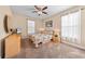 Bedroom with neutral decor, ceiling fan, carpet flooring, and natural light at 668 Barona Dr., Myrtle Beach, SC 29579