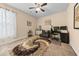 Cozy bedroom with a unique rug, natural light and dedicated workspace at 668 Barona Dr., Myrtle Beach, SC 29579