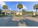 Grand gated entrance showcasing lush landscaping and decorative architectural elements within the community at 668 Barona Dr., Myrtle Beach, SC 29579
