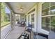 Inviting screened patio with comfortable seating and ceiling fan at 668 Barona Dr., Myrtle Beach, SC 29579