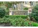 Stone entrance sign for Arrowhead Grande with lush landscaping at 668 Barona Dr., Myrtle Beach, SC 29579