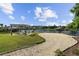 Community waterfront with picnic tables, grill and seating with lake views at 668 Barona Dr., Myrtle Beach, SC 29579