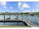 Scenic view of the community waterfront with boat docks and beautiful homes in the background at 668 Barona Dr., Myrtle Beach, SC 29579