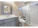 Bright bathroom featuring a glass door shower and modern fixtures at 670 2Nd Ave. N, North Myrtle Beach, SC 29582