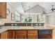 Bright kitchen features a neutral color palette, recessed lighting, and an open layout for seamless entertaining at 670 2Nd Ave. N, North Myrtle Beach, SC 29582