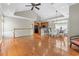 Open-concept living area with hardwood floors, cathedral ceiling, and modern finishes at 670 2Nd Ave. N, North Myrtle Beach, SC 29582