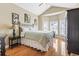 Comfortable bedroom with vaulted ceiling, and natural light at 670 2Nd Ave. N, North Myrtle Beach, SC 29582