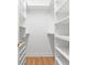 Spacious walk-in closet with custom shelves at 670 2Nd Ave. N, North Myrtle Beach, SC 29582