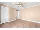 Bedroom with wood-look floors, a ceiling fan, and a doorway at 708 Alexis Dr., Longs, SC 29568