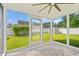 View of screened-in porch with view of fenced backyard at 708 Alexis Dr., Longs, SC 29568