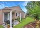 Charming backyard patio with outdoor seating and lush landscaping at 709 Jerdon Circle, North Myrtle Beach, SC 29582