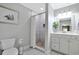 Bathroom with marble floors, large glass shower, and white shaker cabinets at 709 Jerdon Circle, North Myrtle Beach, SC 29582