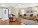 Inviting living room featuring hardwood floors, comfortable furnishings, and ample natural light at 709 Jerdon Circle, North Myrtle Beach, SC 29582