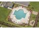 Aerial view of the sparkling community pool with ample lounge seating and a playground at 754 Salerno Circle # F, Myrtle Beach, SC 29579