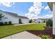 Charming home featuring a well-maintained lawn, an attached garage, and beautiful landscaping at 754 Salerno Circle # F, Myrtle Beach, SC 29579