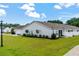 Beautiful home with a spacious lawn, manicured shrubs, a screened porch and a view of the neighborhood at 754 Salerno Circle # F, Myrtle Beach, SC 29579