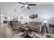 Open-concept living room featuring neutral paint, vaulted ceilings, and wood-look floors at 754 Salerno Circle # F, Myrtle Beach, SC 29579