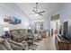 Inviting living room featuring a vaulted ceiling, ceiling fan, and sliding glass doors at 754 Salerno Circle # F, Myrtle Beach, SC 29579