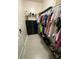 Walk-in closet with rods, shelves, and a black dresser for organizing clothes, shoes, and accessories at 754 Salerno Circle # F, Myrtle Beach, SC 29579