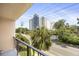 Scenic balcony overlooking lush greenery and urban architecture at 7601 N Ocean Blvd. # 3-B, Myrtle Beach, SC 29572