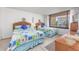 Bright bedroom with two twin beds with patio views through the window at 7601 N Ocean Blvd. # 3-B, Myrtle Beach, SC 29572