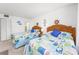 Bright bedroom with two twin beds and nautical accents at 7601 N Ocean Blvd. # 3-B, Myrtle Beach, SC 29572