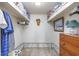 Walk in closet offers ample storage with shelving and drawers at 7601 N Ocean Blvd. # 3-B, Myrtle Beach, SC 29572