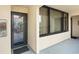 Welcoming entrance with a secure door and a window providing natural light to the entryway at 7601 N Ocean Blvd. # 3-B, Myrtle Beach, SC 29572