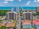 View of condo buildings with ocean views, palm trees and parking, showcasing proximity to the beach at 7601 N Ocean Blvd. # 3-B, Myrtle Beach, SC 29572
