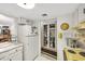 Kitchen showcases white cabinets, appliances, and a walk-in pantry at 7601 N Ocean Blvd. # 3-B, Myrtle Beach, SC 29572