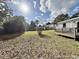 Large backyard featuring a wood deck perfect for outdoor entertaining and relaxation at 7610 Driftwood Dr., Myrtle Beach, SC 29572