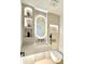 Modern bathroom featuring designer fixtures, unique wall decor, and sleek vanity at 7610 Driftwood Dr., Myrtle Beach, SC 29572