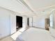 Bright bedroom with a walk-in closet and neutral colors at 7610 Driftwood Dr., Myrtle Beach, SC 29572