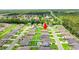 Beautiful aerial view of a neighborhood featuring well-maintained lawns and sidewalks and lush green landscaping at 821 Twickenham Loop, Longs, SC 29568