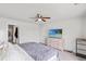 Spacious bedroom featuring ceiling fan, closet, and carpet flooring at 821 Twickenham Loop, Longs, SC 29568