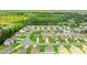 Wide aerial view of a residential neighborhood, showcasing the layout and landscaping at 821 Twickenham Loop, Longs, SC 29568