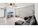Cozy living room with a TV, modern furniture, and an exterior sliding glass door at 821 Twickenham Loop, Longs, SC 29568