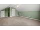 This bedroom features a window and wall shelving at 8708 Coosaw Ct., Myrtle Beach, SC 29577