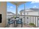 Cozy balcony with seating area, perfect for enjoying outdoor living and neighborhood views at 901 W Port Dr. # 2114, North Myrtle Beach, SC 29582