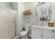 Clean bathroom featuring a glass-enclosed shower, modern vanity, and organized towel rack at 901 W Port Dr. # 2114, North Myrtle Beach, SC 29582
