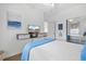 Well-lit bedroom with modern decor, showcasing a comfortable bed and functional storage at 901 W Port Dr. # 2114, North Myrtle Beach, SC 29582