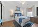 Cozy bedroom featuring a comfortable bed, stylish decor, and ample natural light at 901 W Port Dr. # 2114, North Myrtle Beach, SC 29582