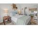 Cozy bedroom featuring a comfortable bed, stylish decor, and an ensuite bathroom for added convenience at 901 W Port Dr. # 2114, North Myrtle Beach, SC 29582