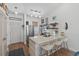 Modern kitchen featuring sleek countertops, stainless steel appliances, and a convenient breakfast bar at 901 W Port Dr. # 2114, North Myrtle Beach, SC 29582