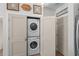 Convenient laundry closet with a stacked washer and dryer unit, maximizing space efficiency at 901 W Port Dr. # 2114, North Myrtle Beach, SC 29582