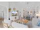 Inviting living room with comfortable seating, TV, and open floor plan to kitchen and dining area at 901 W Port Dr. # 2114, North Myrtle Beach, SC 29582